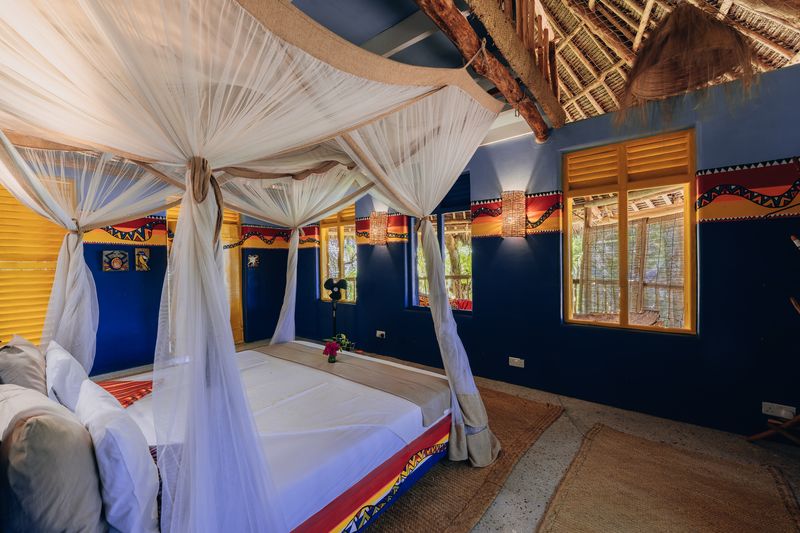 Indigo bedroom with mosquito net