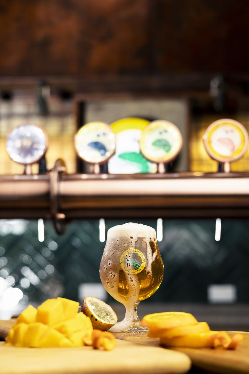 Snifter glass beer with mango and passion fruit