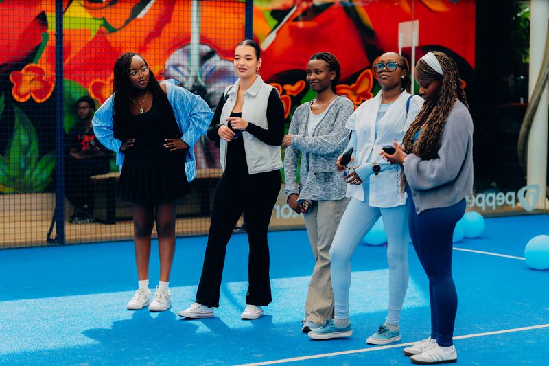 Nani's Heineken — five women on padel court