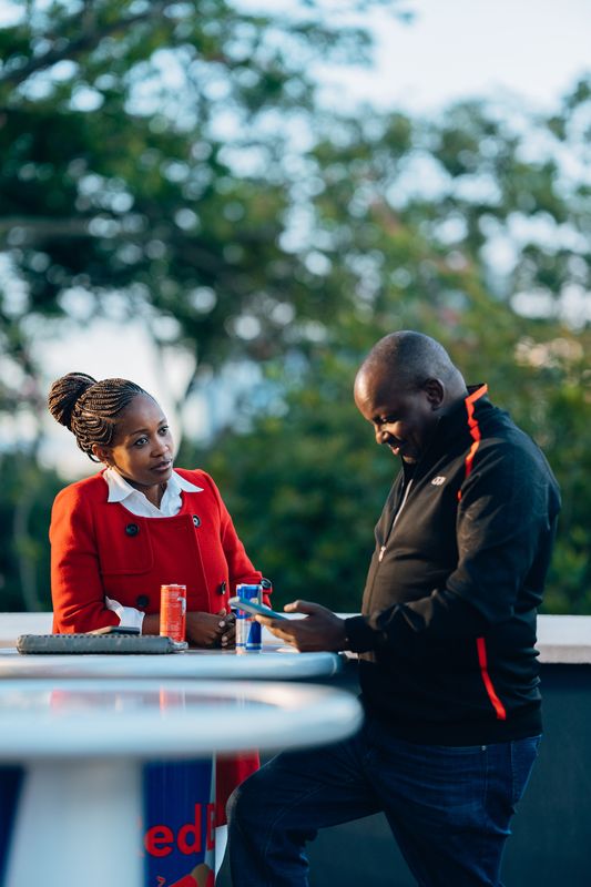 Red Bull Basement — conversation, red coat