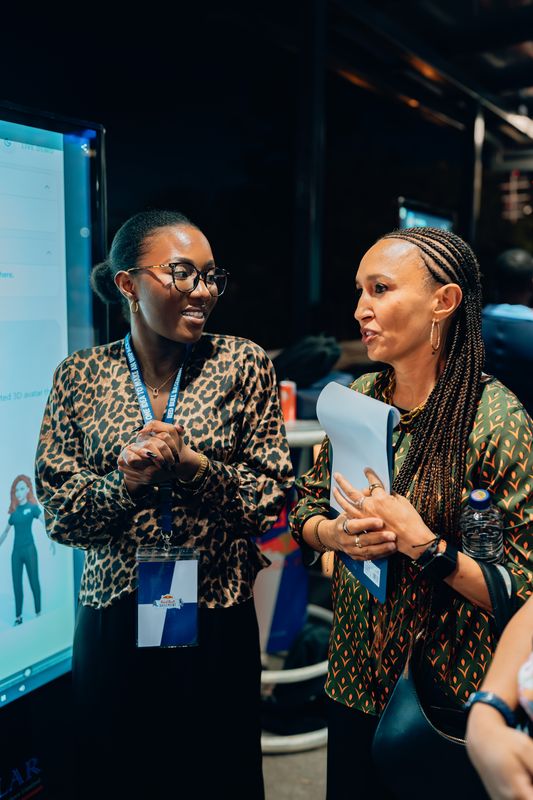 Red Bull Basement — two women laughing